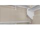 Walk-in closet with multiple shelves and hanging rods for plenty of storage at 6599 Netherseal Ave, Las Vegas, NV 89139