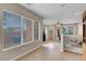 Dining room with large windows providing ample natural light and tile floors at 6599 Netherseal Ave, Las Vegas, NV 89139