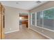 Dining room next to the kitchen featuring tile floors and large windows at 6599 Netherseal Ave, Las Vegas, NV 89139