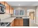 Bright kitchen showcasing ample counter space, cabinetry, and eat-in space at 6599 Netherseal Ave, Las Vegas, NV 89139