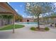 Community pool area with a bath house and gazebo at 6599 Netherseal Ave, Las Vegas, NV 89139