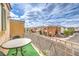 Private balcony with furniture and a view of the neighborhood at 6623 Hurkling Stone Ave, Las Vegas, NV 89139