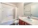 Functional bathroom with a shower-tub combo, vanity, and classic fixtures, designed for comfort at 6623 Hurkling Stone Ave, Las Vegas, NV 89139