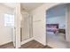 Bathroom with a shower and view into the main bedroom at 6623 Hurkling Stone Ave, Las Vegas, NV 89139
