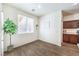 Cozy dining area with wood-style floors, bright lighting, and direct access to the kitchen at 6623 Hurkling Stone Ave, Las Vegas, NV 89139