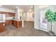 Modern kitchen with wood cabinetry, stainless steel appliances, and an open layout at 6623 Hurkling Stone Ave, Las Vegas, NV 89139