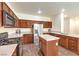 Well-equipped kitchen with stainless steel appliances, sleek countertops, and ample cabinet space at 6623 Hurkling Stone Ave, Las Vegas, NV 89139