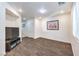 Comfortable living area with wood-style flooring, neutral paint, and abundant natural light at 6623 Hurkling Stone Ave, Las Vegas, NV 89139