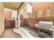 Cozy outdoor patio area complete with a grill for entertaining, perfect for barbecues at 6623 Hurkling Stone Ave, Las Vegas, NV 89139