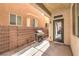 Enclosed patio area with a grill, offering a private outdoor space to relax or entertain guests at 6623 Hurkling Stone Ave, Las Vegas, NV 89139