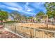 Neighborhood playground area with swings, a gazebo, and plenty of space for children to play at 6623 Hurkling Stone Ave, Las Vegas, NV 89139