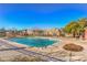 Sparkling community pool surrounded by a spacious deck, perfect for relaxation and recreation at 6623 Hurkling Stone Ave, Las Vegas, NV 89139