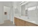 Bathroom features a double vanity, and a shower-tub combo at 6705 Frances Celia Ave, Las Vegas, NV 89122