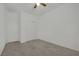 This bedroom features neutral walls, carpet flooring, two closets and a ceiling fan at 6705 Frances Celia Ave, Las Vegas, NV 89122