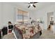Cozy bedroom showcasing a comfortable bed and a well-lit vanity area at 6705 Frances Celia Ave, Las Vegas, NV 89122