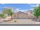 Charming single-story home with a two-car garage and low-maintenance landscaping at 6705 Frances Celia Ave, Las Vegas, NV 89122