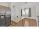 Kitchen with eat-in dining area features stainless steel refrigerator and center island at 6705 Frances Celia Ave, Las Vegas, NV 89122