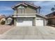 Charming two-story home with a two-car garage and well-maintained landscaping at 6736 Quinella Dr, Las Vegas, NV 89103