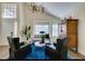 Bright living room with vaulted ceilings, stylish light fixture, and modern decor at 6736 Quinella Dr, Las Vegas, NV 89103