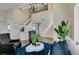 Open-concept living area with high ceilings, modern furniture, and lots of natural light at 6736 Quinella Dr, Las Vegas, NV 89103