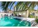 Inviting backyard pool with patio seating, perfect for outdoor relaxation and entertaining at 6736 Quinella Dr, Las Vegas, NV 89103