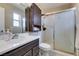Functional bathroom featuring a shower, sink, and toilet, offering essential amenities for daily use at 709 Jonathan Glen Way, Las Vegas, NV 89145