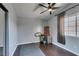 Bedroom featuring hardwood floors, ceiling fan and natural light at 709 Jonathan Glen Way, Las Vegas, NV 89145
