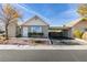 Charming single-story home with covered parking and well-maintained landscaping at 709 Jonathan Glen Way, Las Vegas, NV 89145