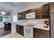 Kitchen featuring a view into the dining room with chandelier lighting at 709 Jonathan Glen Way, Las Vegas, NV 89145