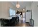 Bright eat-in kitchen featuring chandelier lighting and stainless steel appliances at 709 Jonathan Glen Way, Las Vegas, NV 89145