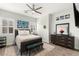 Comfortable bedroom with a bed, stylish decor, and large windows for natural light at 7165 N Grand Canyon Dr, Las Vegas, NV 89149