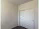 Bedroom with sliding closet doors at 7246 Spring Flower Ave, Las Vegas, NV 89117
