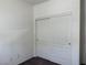 This bedroom offers a neutral color palette and a closet with sliding doors at 7246 Spring Flower Ave, Las Vegas, NV 89117