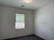 Bedroom with a single window at 7246 Spring Flower Ave, Las Vegas, NV 89117