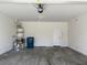 Spacious garage with ample storage and a convenient garage door opener at 7246 Spring Flower Ave, Las Vegas, NV 89117