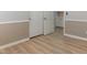 This bedroom features wood flooring and neutral paint, with access to a closet at 7892 Nookfield Dr, Las Vegas, NV 89147