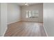 Spacious bedroom with vaulted ceilings, wood floors and window with plantation shutters at 7892 Nookfield Dr, Las Vegas, NV 89147