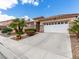 Well-maintained single-story home with a clean driveway and desert landscaping at 7892 Nookfield Dr, Las Vegas, NV 89147