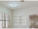 Bright and airy living space featuring contemporary lighting and plantation shutters at 7892 Nookfield Dr, Las Vegas, NV 89147