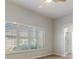 Large main bedroom with plantation shutters and archway entry to ensuite bathroom at 7892 Nookfield Dr, Las Vegas, NV 89147