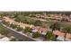 Overhead view of the neighborhood with lush landscaping and golf course at 8901 Litchfield Ave, Las Vegas, NV 89134