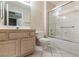 Bathroom featuring a single sink vanity and glass enclosed tub shower at 8901 Litchfield Ave, Las Vegas, NV 89134