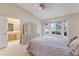 Primary bedroom with a bay window, and ensuite bathroom access at 8901 Litchfield Ave, Las Vegas, NV 89134