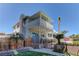 Charming two-story home with well-maintained landscaping and a welcoming entrance at 893 Fairway Dr, Boulder City, NV 89005