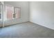 Neutral bedroom with ample natural light, plush carpeting, and a serene atmosphere, offering a comfortable and inviting space at 8985 S Durango Dr # 2081, Las Vegas, NV 89113