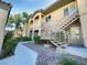 Exterior view of condo building with stairs and landscaping at 8985 S Durango Dr # 2081, Las Vegas, NV 89113