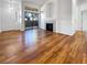 Bright living room with wood floors, fireplace, recessed lights and sliding glass door at 8985 S Durango Dr # 2081, Las Vegas, NV 89113