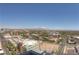 Wide aerial shot of a city neighborhood with mountains in the distance, showcasing the urban landscape at 900 Las Vegas Blvd # 1113, Las Vegas, NV 89101