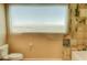 Modern bathroom features a stylish vanity with patterned tile and a soaking tub with views at 900 Las Vegas Blvd # 1113, Las Vegas, NV 89101