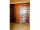Well-organized closet with wooden shelves and drawers, offering efficient storage solutions at 900 Las Vegas Blvd # 1113, Las Vegas, NV 89101